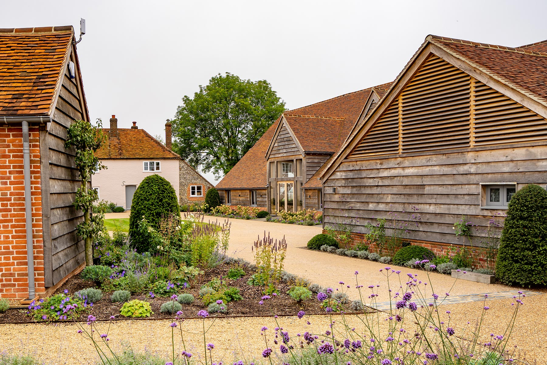 The restored barn and gardens at Rackleys Chiltern Hills